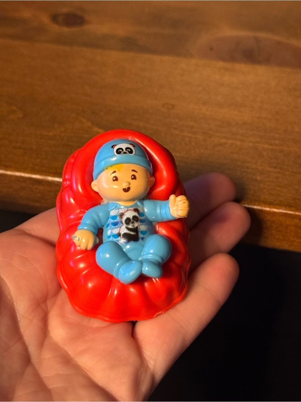 Blue asian Baby little people Figure on Red Rocking Seat